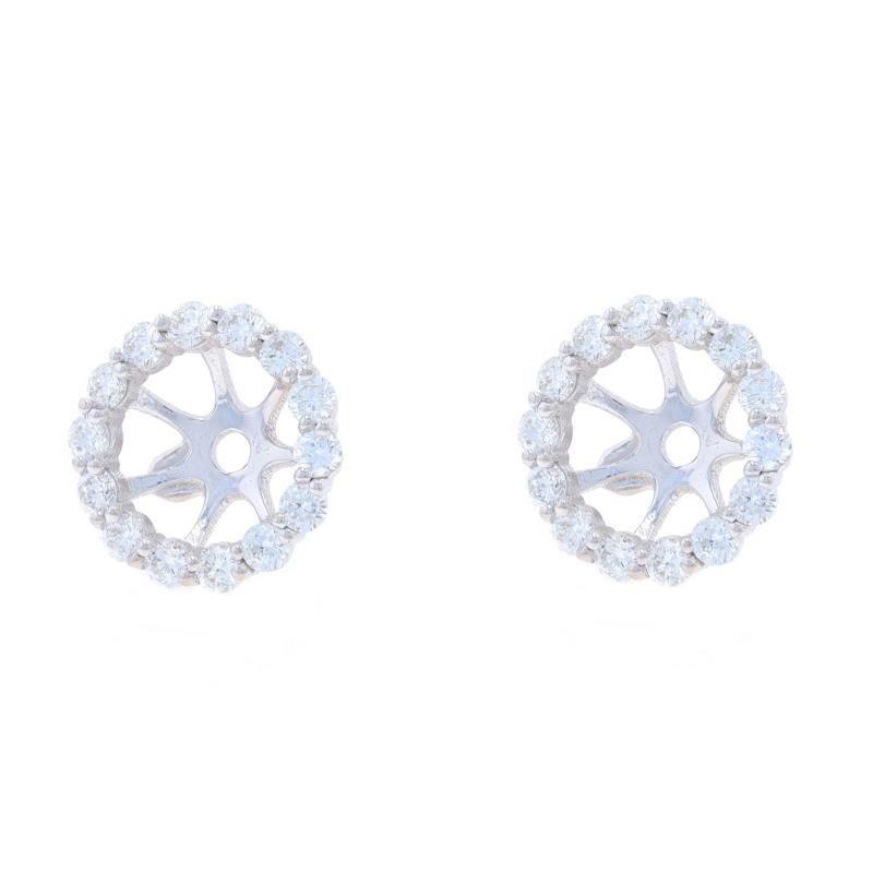 Metal Content: 14k White Gold

Stone Information

Natural Diamonds
Carat(s): 1.12ctw
Cut: Round Brilliant
Color: F - G
Clarity: VS1 - VS2

Total Carats: 1.12ctw

Style: Halo Earring Enhancer Stud Jackets

Measurements

Tall: 1/2