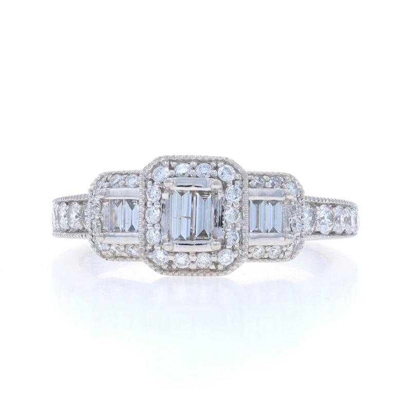 Size: 6 1/2
Sizing Fee: Up 1 size for $35 or Down 1/2 a size for $35

Metal Content: 14k White Gold

Stone Information

Natural Diamonds
Carat(s): .75ctw
Cut: Round Brilliant & Baguette
Color: H - I
Clarity: I1
Certified by: IGI
Report Number: