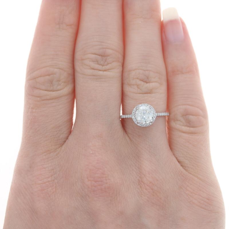 Size: 6 1/2
Sizing Fee: Up 2 sizes for $35

Metal Content: 14k White Gold

Stone Information
Natural Diamond
Carat(s): .90ct
Cut: Round Brilliant 
Color: K
Clarity: I2
Stone Note: (solitaire)

Natural Diamonds
Carat(s): .20ctw
Cut: Single 
Color: H