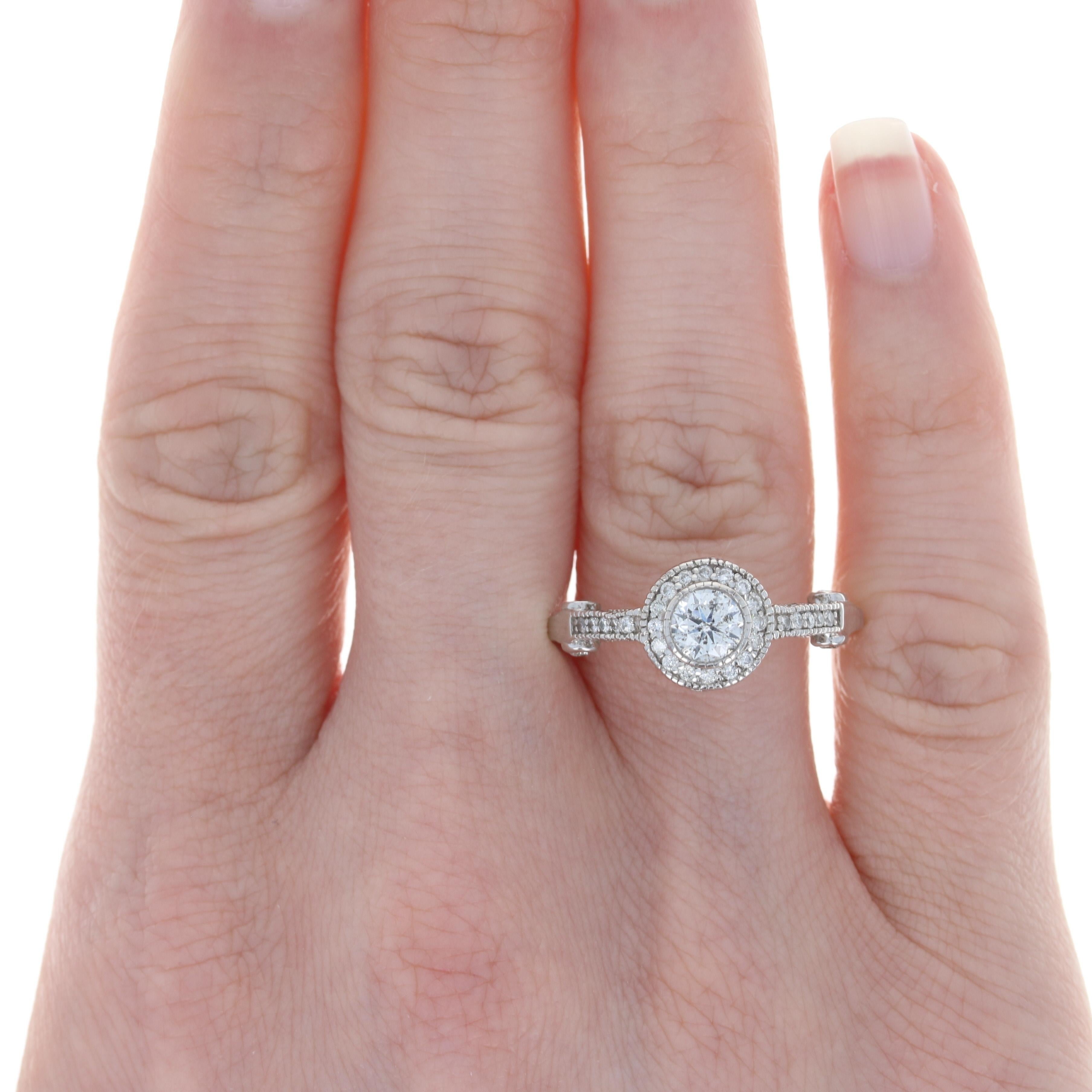 Size: 9 1/4
Sizing Fee: Up or Down 2 sizes for $25

Metal Content: 14k White Gold

Stone Information: 
Natural Diamond Solitaire
Carat: .50ct
Cut:  Round Brilliant
Color: H 
Clarity: I1 (eye clean)

Natural Diamond Accents
Carats: .78ctw 
Cut: Round