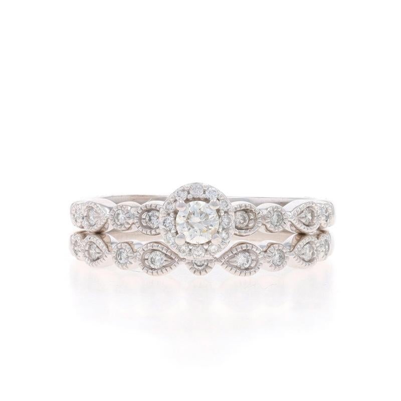 Size: 7
Sizing Fee: Up 3 sizes for $60 or Down 1 size for $40

Metal Content: 10k White Gold

Stone Information

Natural Diamonds
Carat(s): .24ctw
Cut: Round Brilliant
Color: G - H
Clarity: SI1 - SI2

Total Carats: .24ctw

Engagement Ring Style: