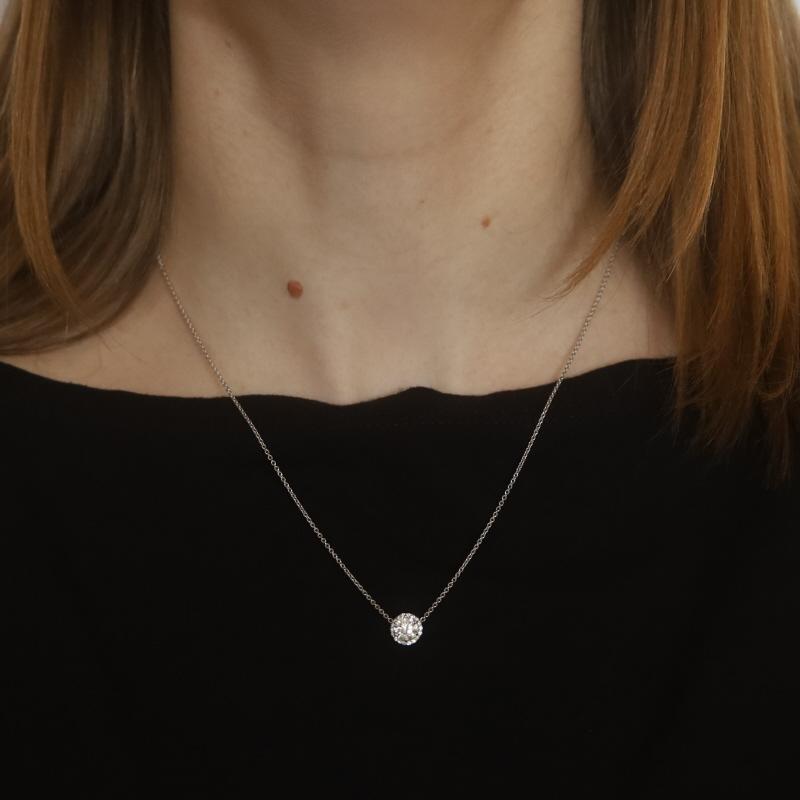 Metal Content: 14k White Gold

Stone Information
Natural Diamond
Carat(s): .75ct
Cut: Round Brilliant
Color: H
Clarity: I1
Certified by: GIA
Report Number: 5221873364

Natural Diamonds
Carat(s): .12ctw
Cut: Round Brilliant
Color: G
Clarity: VS1 -