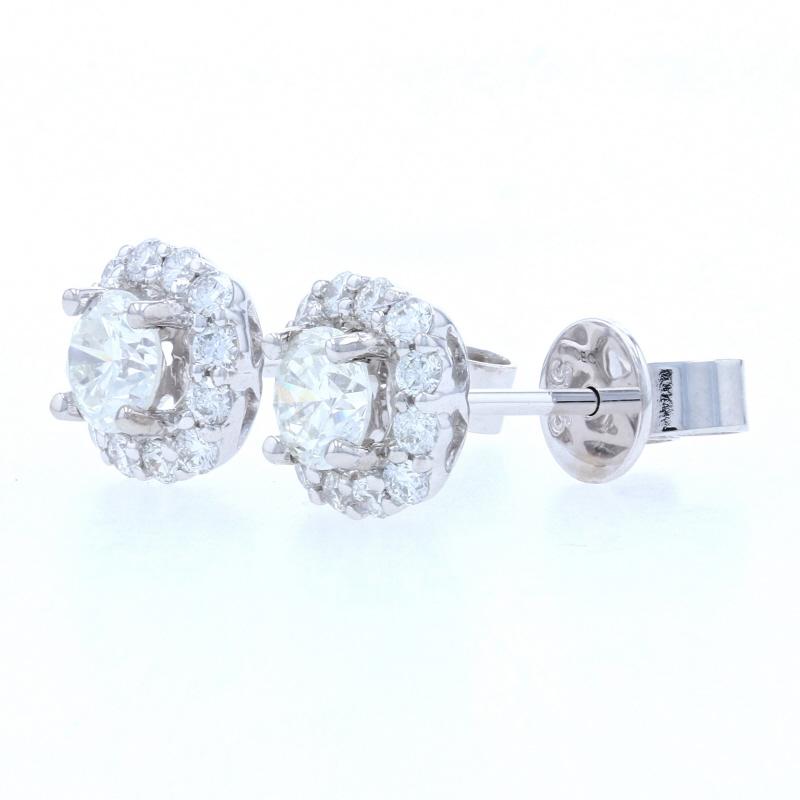 Metal Content: 14k White Gold 

Stone Information: 
Natural Diamonds (centers)
Carats: .62ctw
Cut: Round Brilliant 
Color: G - H
Clarity: SI1 - SI2 
Diameter: 4.2mm

Natural Diamonds (accents)
Carats: .33ctw
Cut: Round Brilliant 
Color: G
Clarity:
