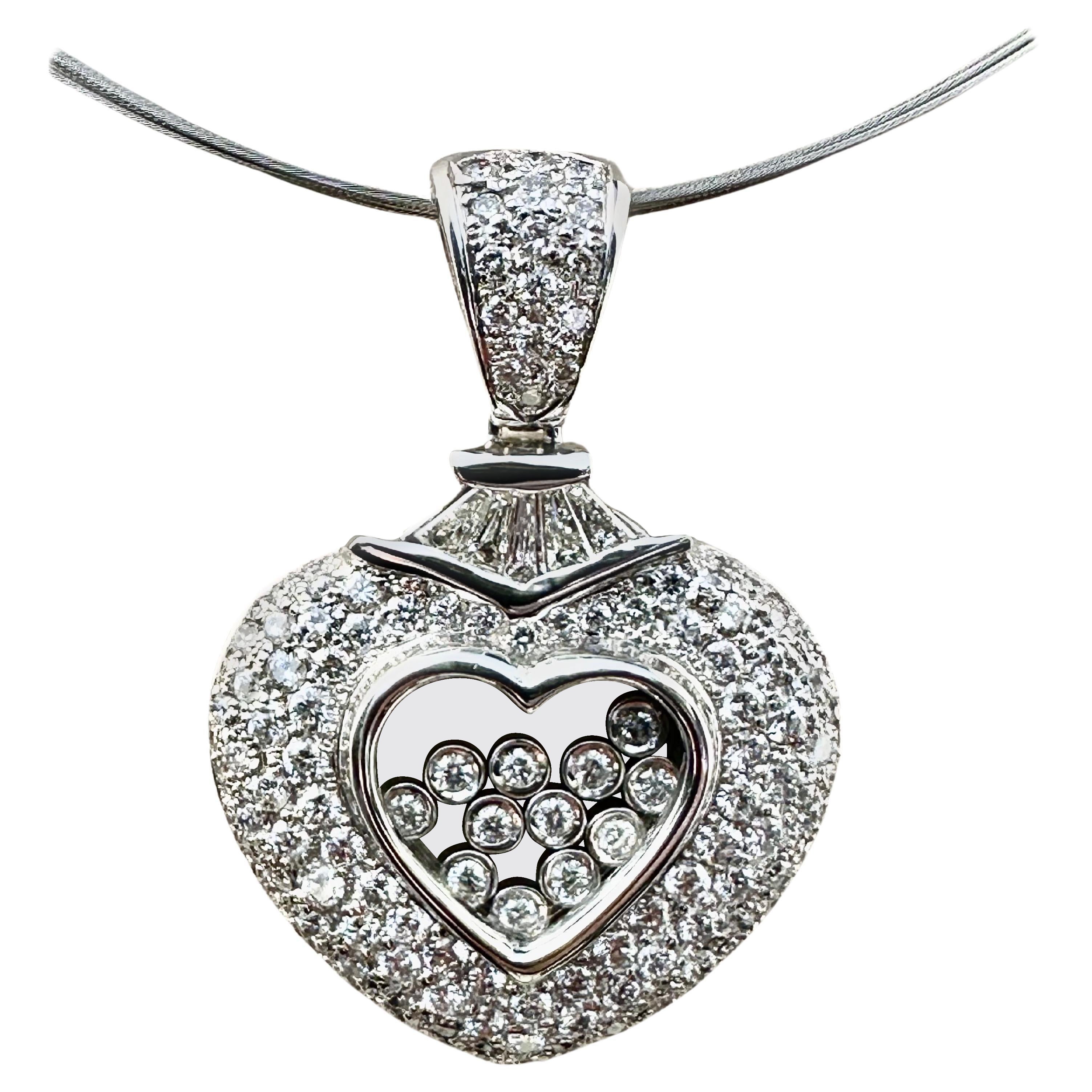 Collier cœur en or blanc 18 carats avec diamants flottants en vente