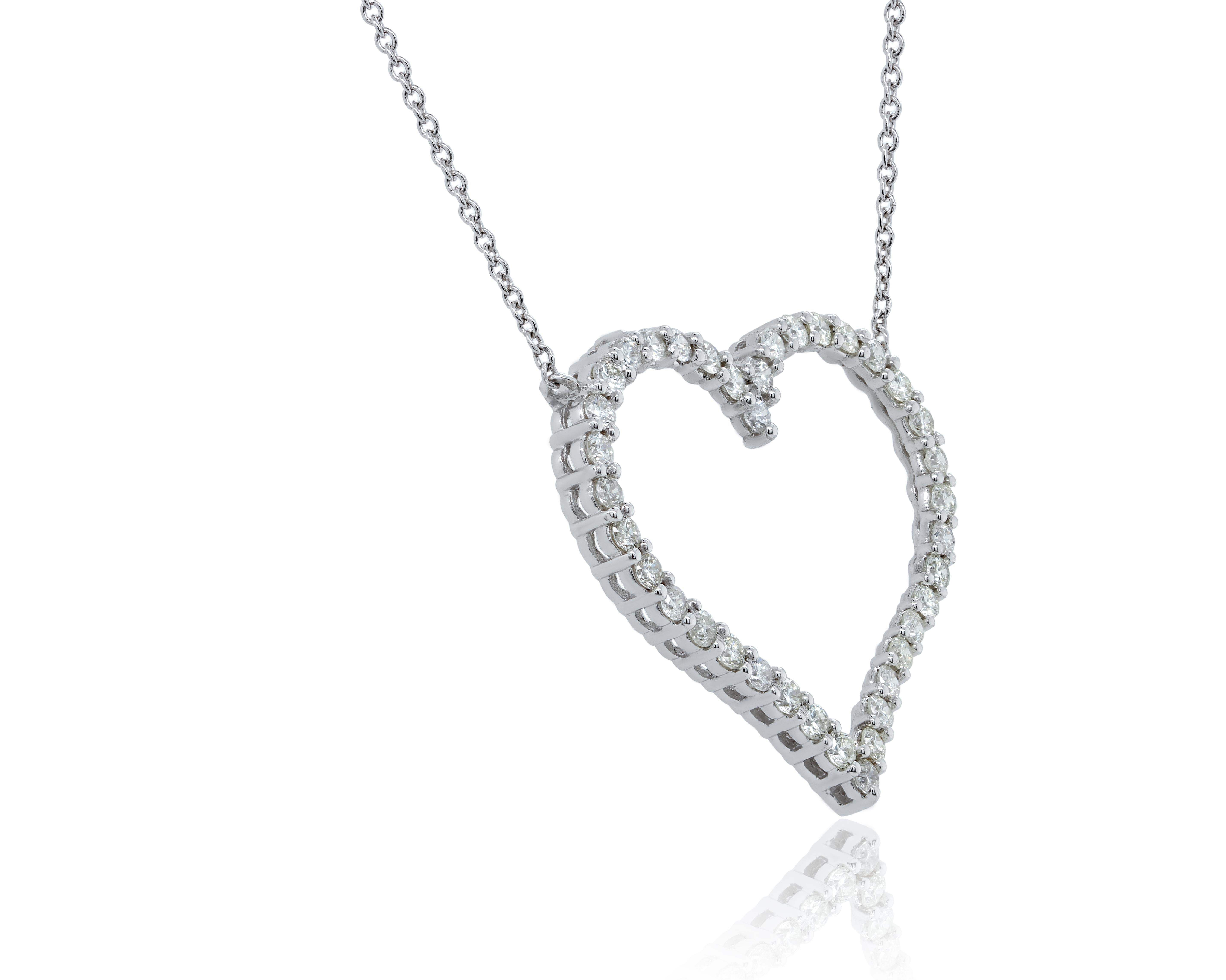 This beautiful open heart pendant features 1.00  total weight of round brilliant cut diamonds.
1  1/2