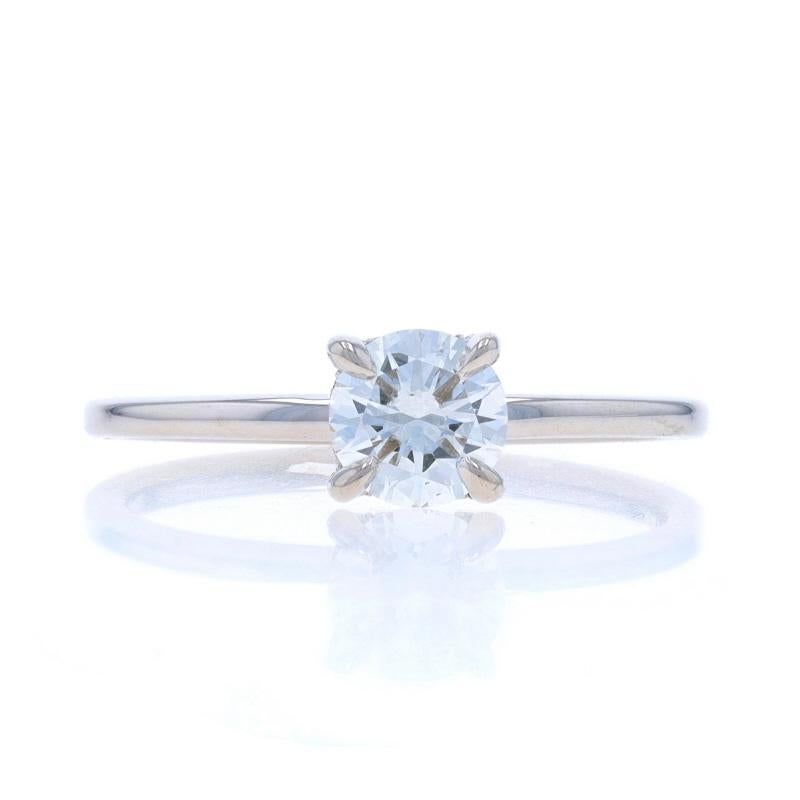 Taille : 7
Frais de taille : Up&Up pour 40 $ ou Down pour 40 $.

Contenu métallique : Or blanc 14k

Informations sur les pierres
Diamant naturel
Carat(s) : .59ct
Coupe : Brillant rond
Couleur : E
Clarté : SI1
Certifié par : GIA
Numéro de rapport :