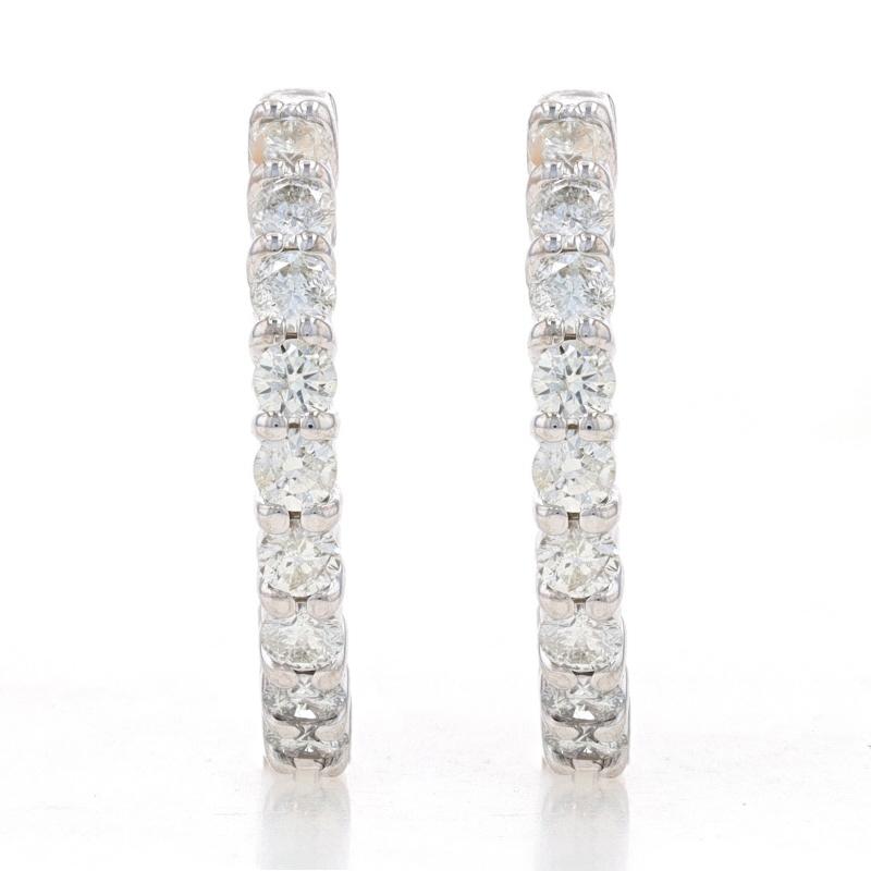 Metal Content: 14k White Gold

Stone Information

Natural Diamonds
Carat(s): 2.04ctw
Cut: Round Brilliant
Color: J - K
Clarity: SI2 - I1

Total Carats: 2.04ctw

Style: Inside-Out Hoop
Fastening Type: Snap Closures

Measurements

Tall: 27/32