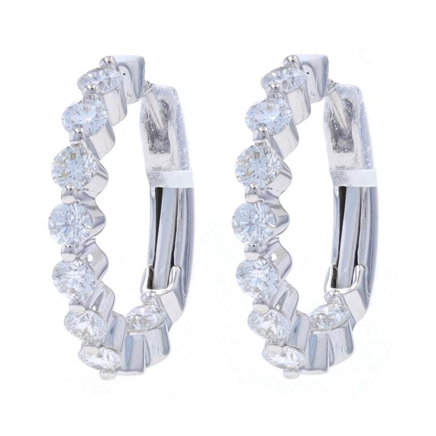 Metal Content: 18k White Gold

Stone Information
Natural Diamonds
Carat(s): 1.00ctw
Cut: Round Brilliant
Color: G
Clarity: SI1

Total Carats: 1.00ctw

Style: Inside-Out Hoop
Fastening Type: Leverback Closures

Measurements
Tall: 11/16