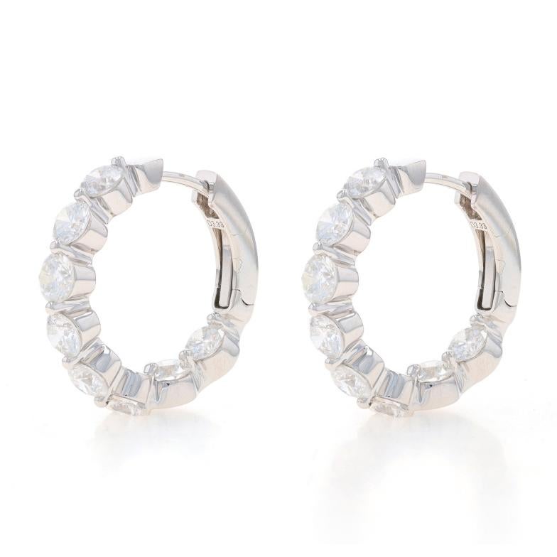 Metal Content: 18k White Gold

Stone Information
Natural Diamonds
Carat(s): 2.97ctw
Cut: Round Brilliant
Color: G
Clarity: SI1 - SI2

Total Carats: 2.97ctw

Style: Inside-Out Hoop
Fastening Type: Leverback Closures

Measurements
Tall: 13/16