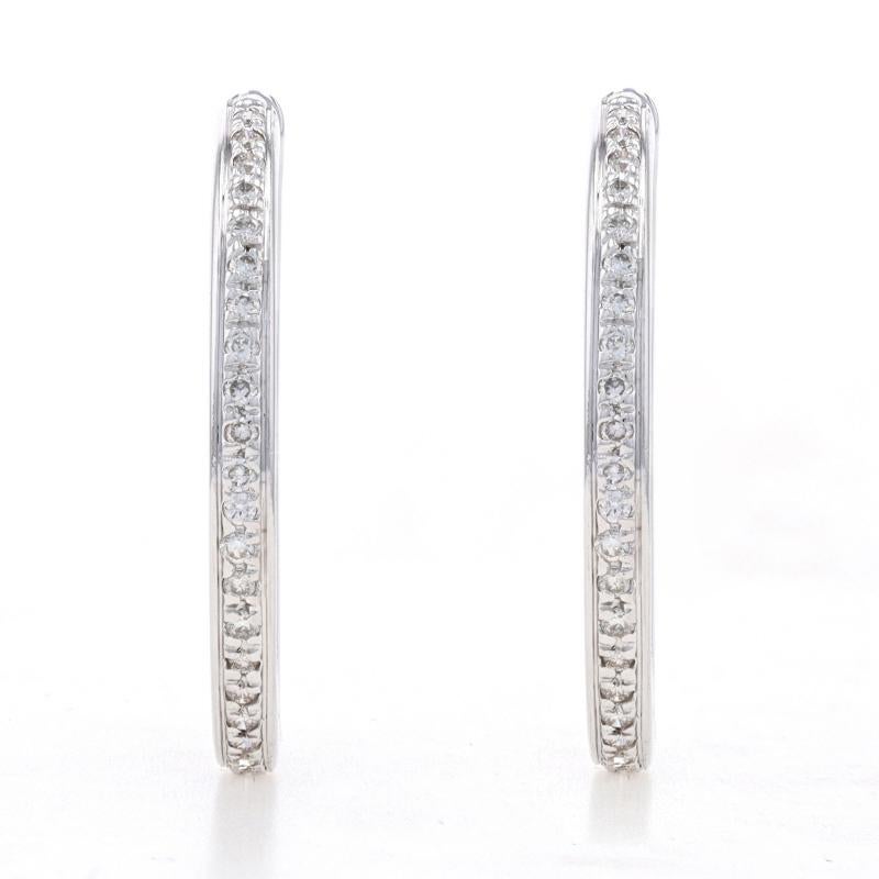 Metal Content: 14k White Gold

Stone Information

Natural Diamonds
Carat(s): 1.50ctw
Cut: Round Brilliant
Color: H - I
Clarity: SI1 - SI2

Total Carats: 1.50ctw

Style: Inside-Out Hoops 
Fastening Type: Snap Closures

Measurements

Tall: 1 3/16