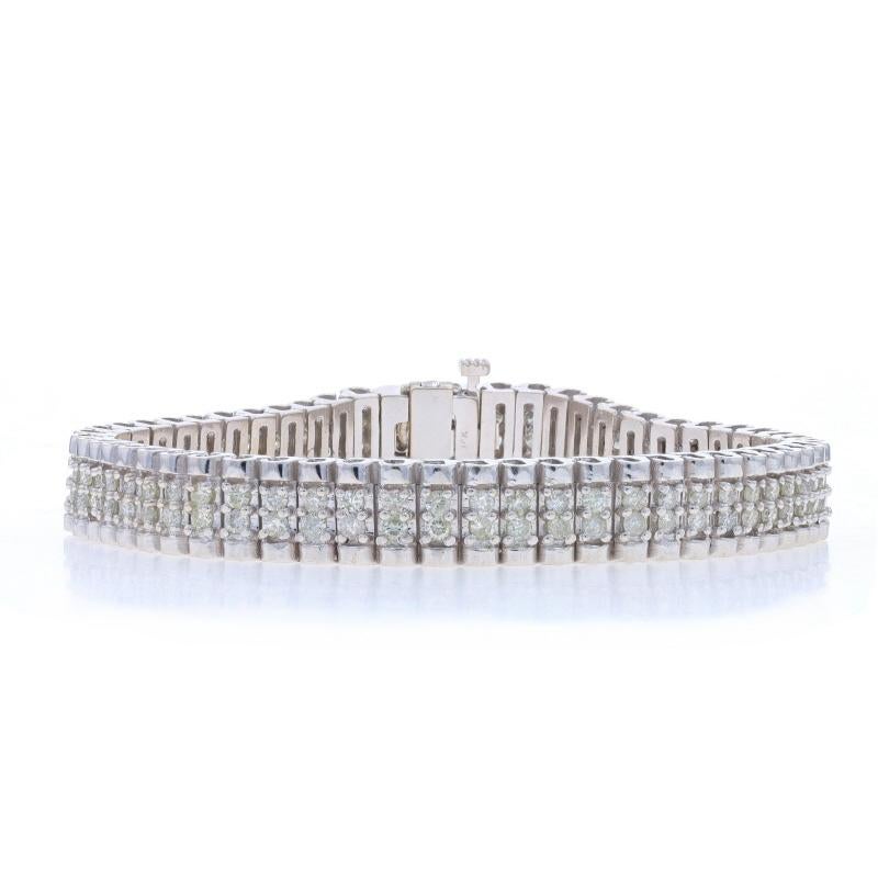 Contenu métallique : Or blanc 14k

Informations sur les pierres

Diamants naturels
Carat(s) : 3.00ctw
Coupe : Brillant rond
Couleur : K - L - M.
Clarté : I1 - I2

Total des carats : 3.00ctw

Style : Lien
Type de fermeture : Fermeture à onglet avec