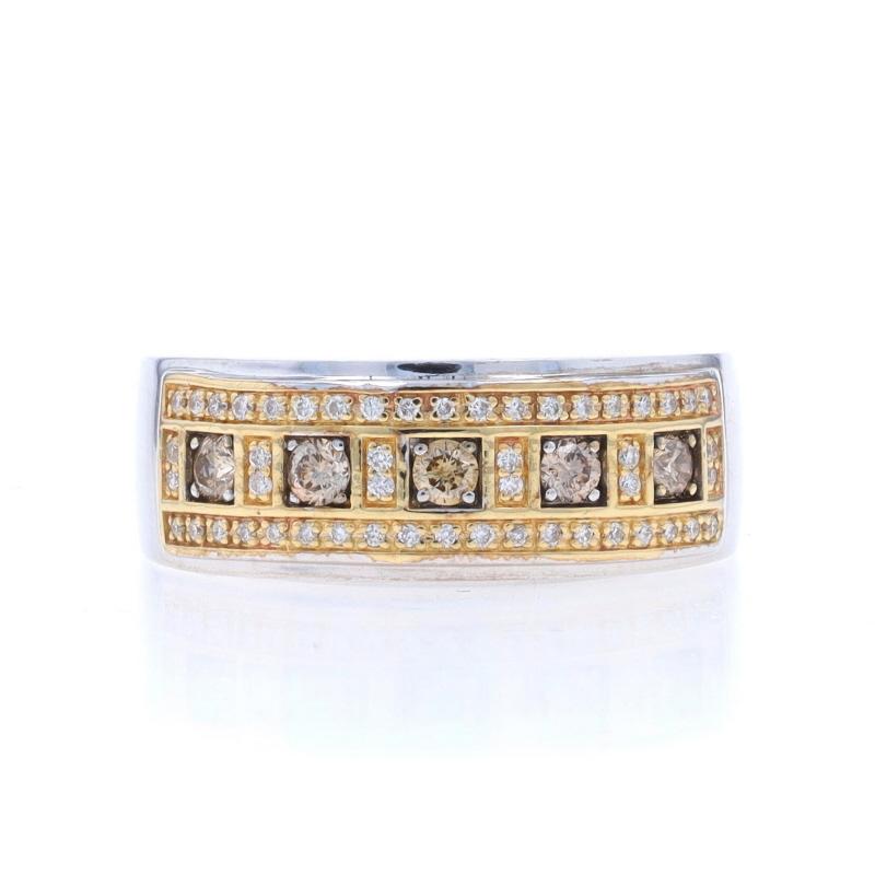 Size: 9 3/4
Sizing Fee: Up 2 sizes for $50 or Down 1 size for $40

Metal Content: 10k White Gold & 10k Yellow Gold

Stone Information

Natural Diamonds
Carat(s): .30ctw
Cut: Round Brilliant
Color: Champagne Brown
Clarity: SI1 - SI2

Natural