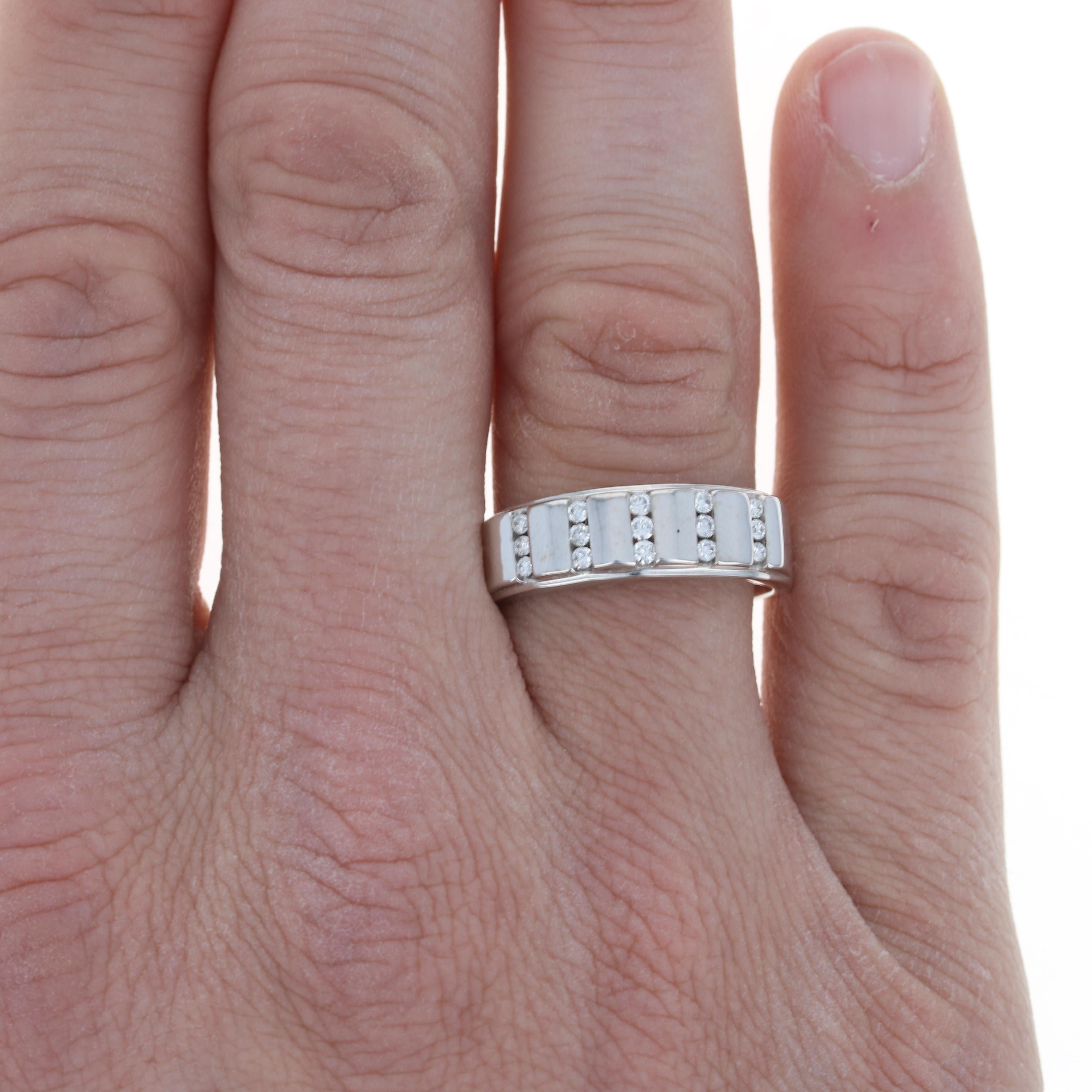 Size: 11 3/4
Sizing Fee: Up 2 sizes for $50

Metal Content: 14k White Gold 

Stone Information: 
Natural Diamonds
Total Carats: .25ctw
Cut: Round Brilliant
Color: G - H
Clarity: SI1 - SI2

Style: Wedding Band with Diamonds
Features: Ribbed