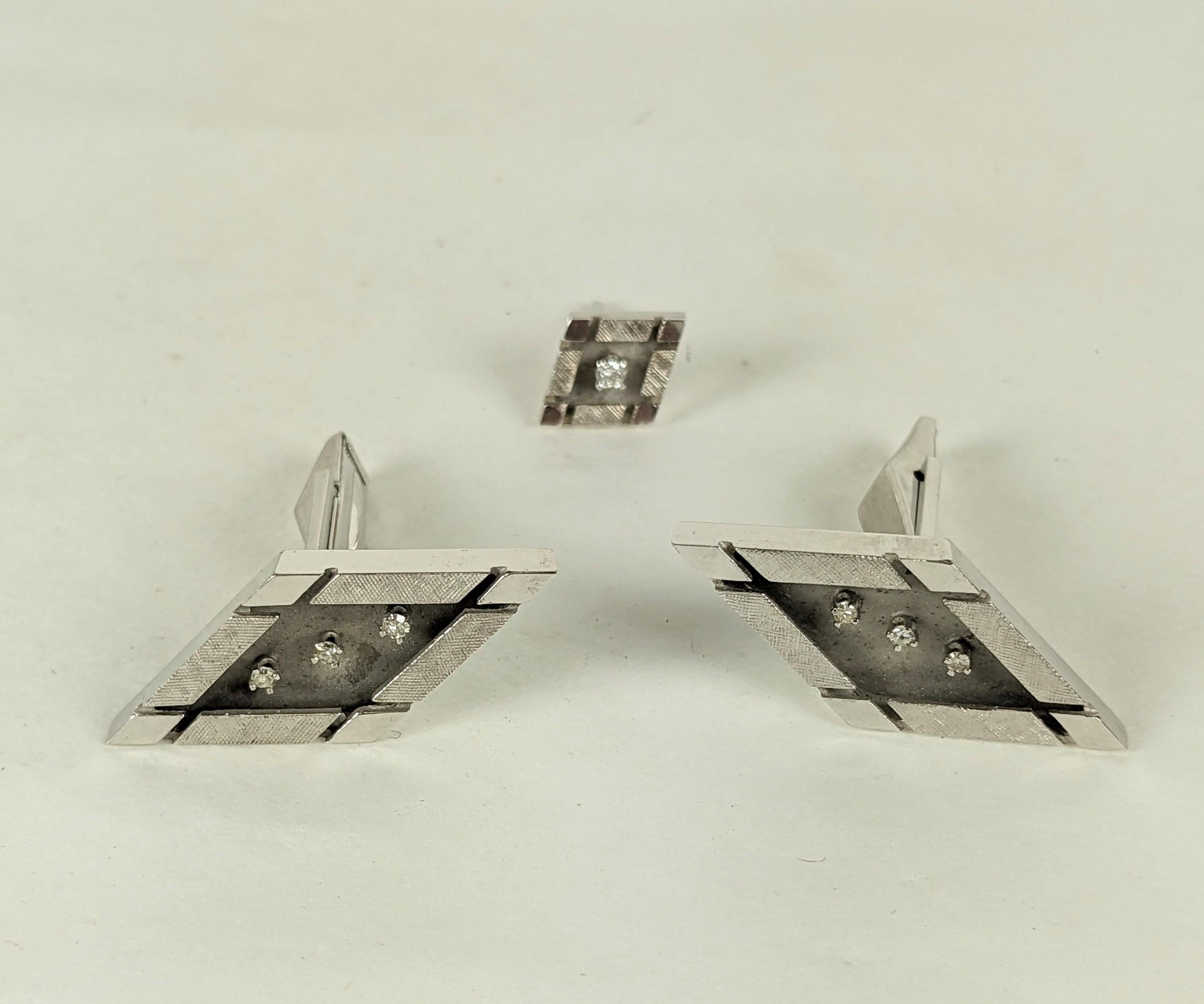 Elegant White Gold Diamond Modernist Cufflink Set from the 1960's. Textured and high polished 14k white gold contrast in the diamond shape with diamond accents and hard shank swivel finding. Matching tie tac as well. Each measures 1.25