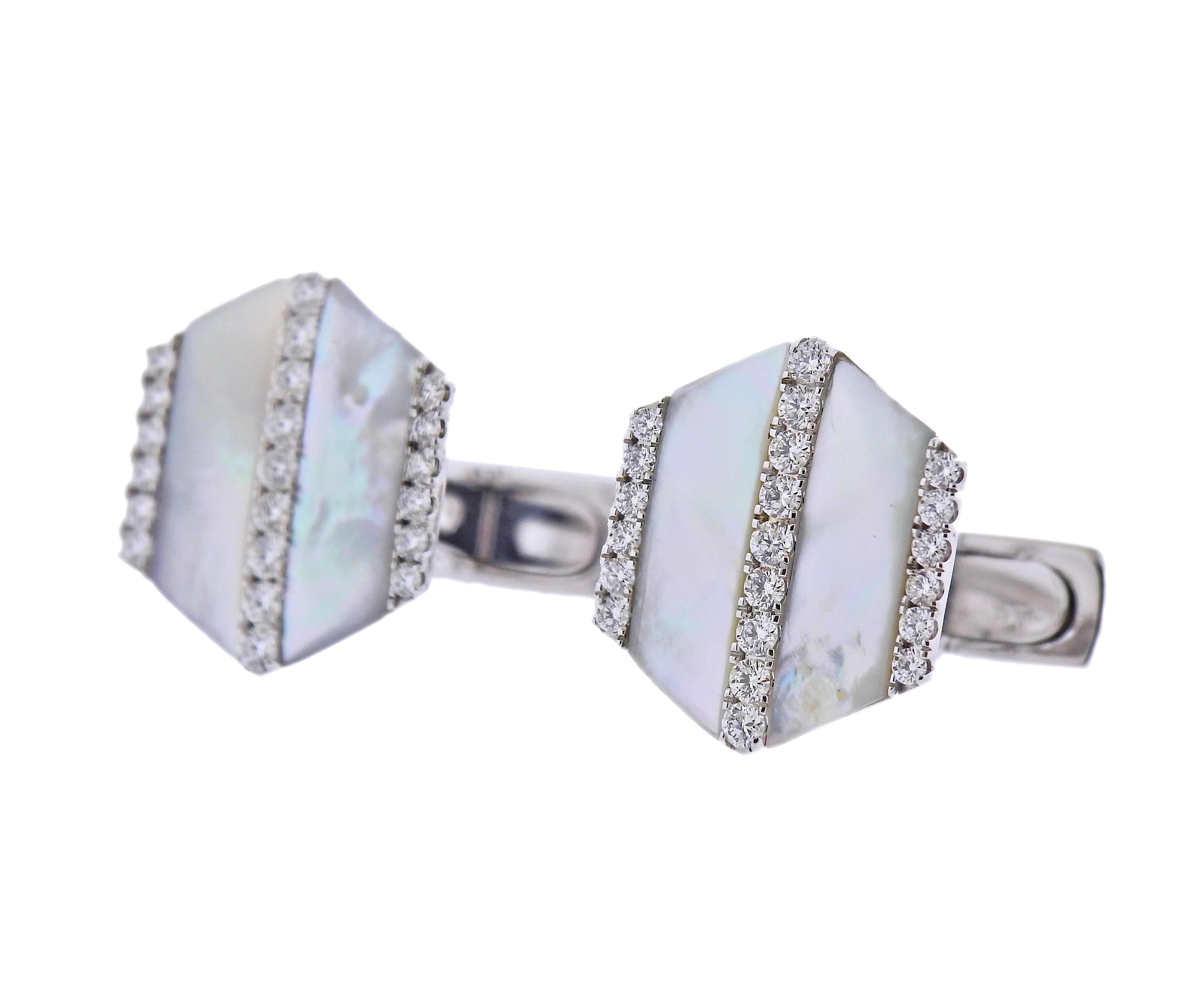 14k White Gold cufflinks. Set with 0.50ctw in SI F/G diamonds and Mother of Pearl. Cufflinks measure 17mm x 15mm. Marked - Eravos, 14k. Weight - 7.6 grams.
