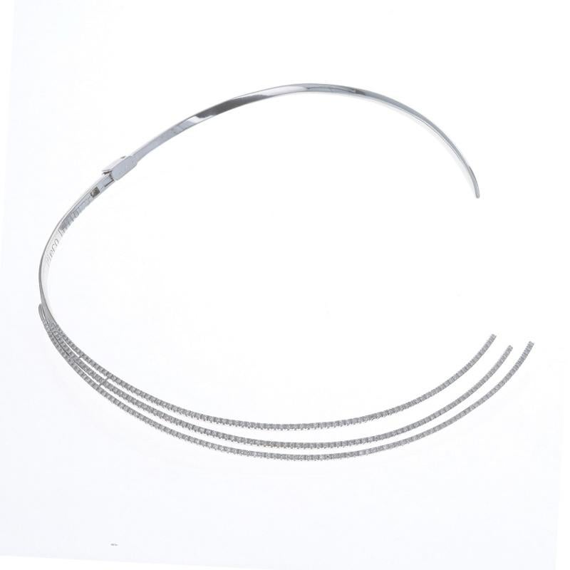 Brand: Piero Milano

Metal Content: 18k White Gold

Stone Information
Natural Diamonds
Carat(s): 3.00ctw
Cut: Round Brilliant
Color: F - G
Clarity: VS1 - VS2

Total Carats: 3.00ctw

Style: Cuff Choker
Fastening Type: Hinged Clasp with Fold-Over