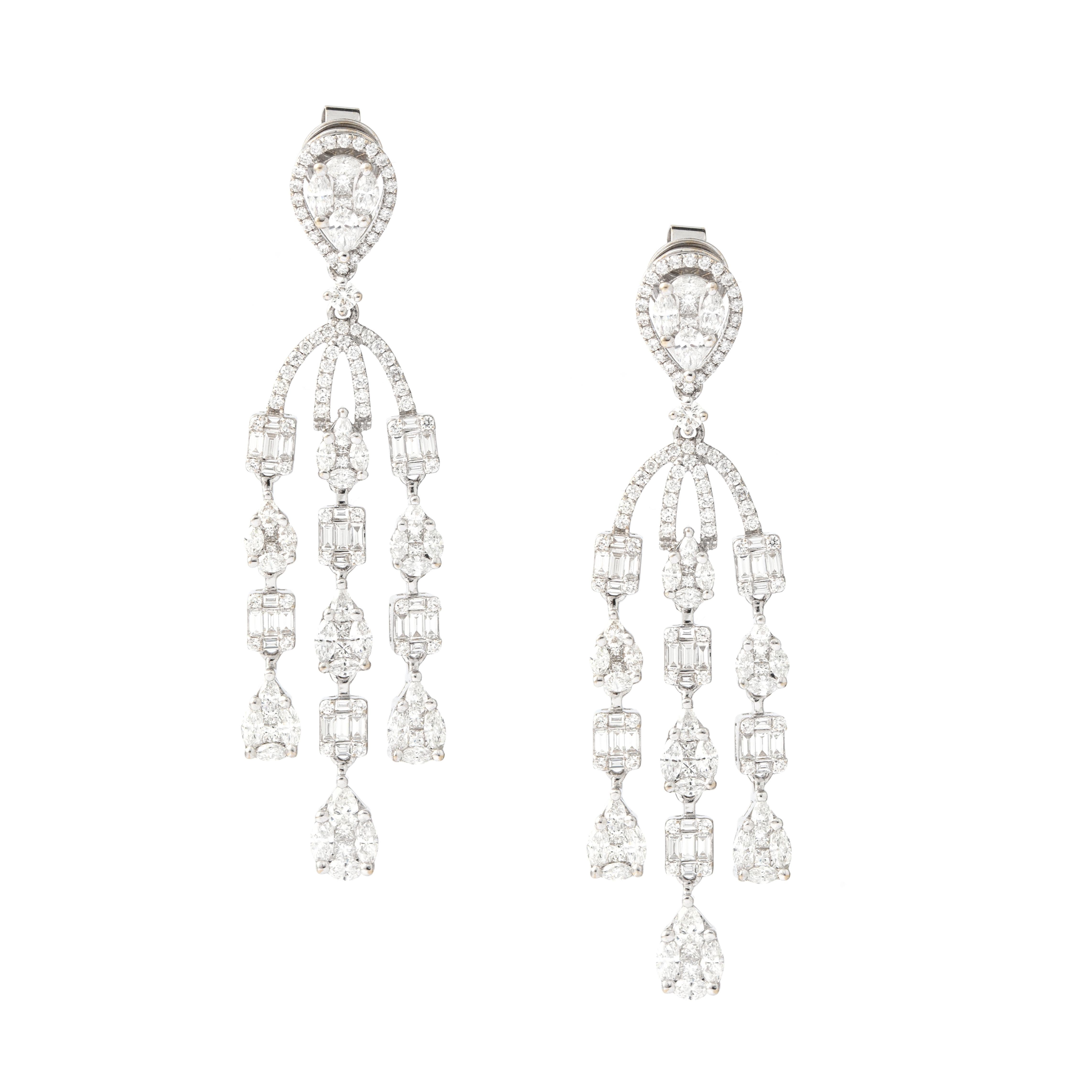 Earrings in 18kt white gold set with 156 pears shape, baguette, princess marquise cut diamonds 4.97 cts and 150 diamonds 1.08 cts.

Length: 6.00 centimeters (2.36 inches).

Maximum Width : 2.00 centimeters (0.79 inches).

Total weight: 19.05 grams.