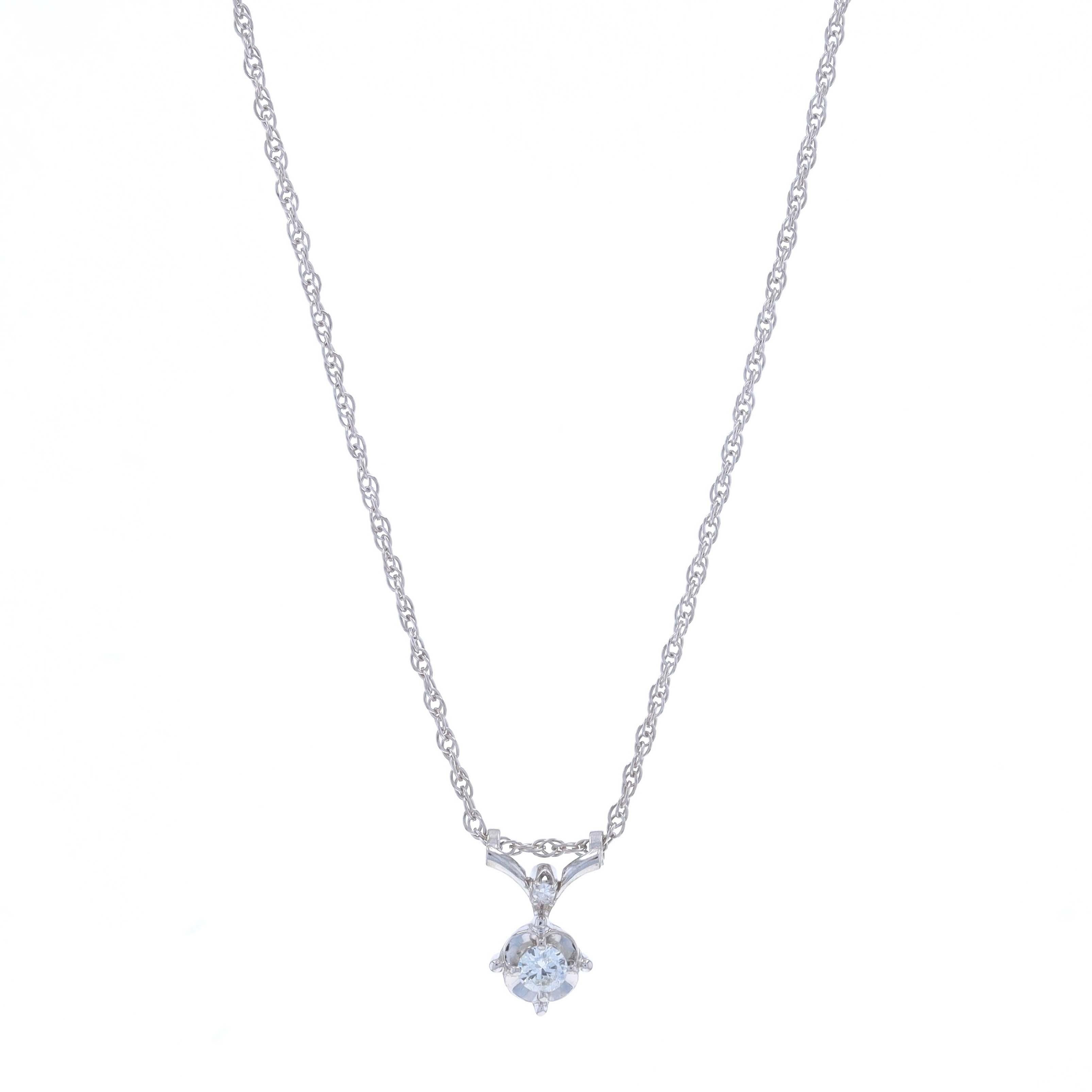 Metal Content: 14k White Gold

Stone Information

Natural Diamond
Carat(s): .15ct
Cut: Round Brilliant
Color: H
Clarity: VS1

Natural Diamond
Carat(s): .01ct
Cut: Single
Color: G
Clarity: VS1

Total Carats: .16ctw

Style: Solitaire with Accent
Chain