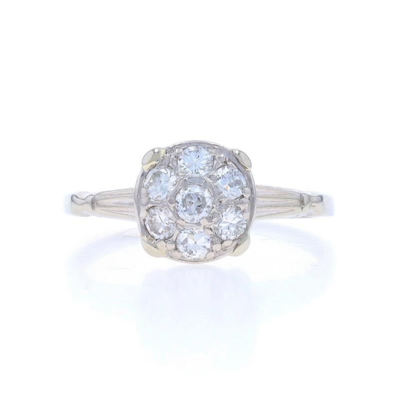 Size: 4 3/4
Sizing Fee: Up 1 1/2 sizes for $35 or Down 1 size for $35

Era: Retro
Date: 1940s - 1950s

Metal Content: 14k White Gold

Stone Information

Natural Diamonds
Carat(s): .38ctw
Cut: Round Brilliant
Color: G - H
Clarity: SI1 - SI2

Total