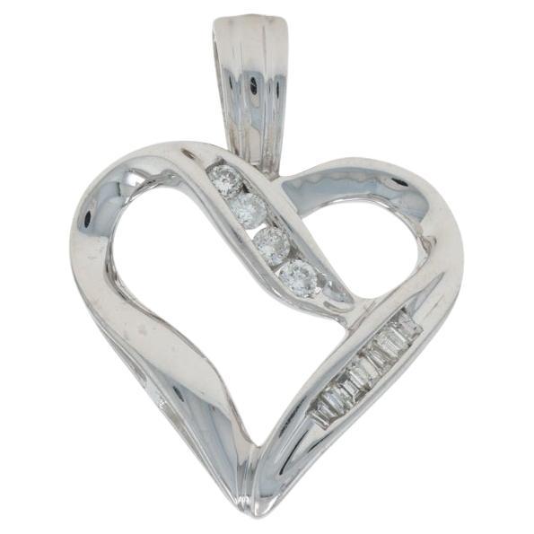 White Gold Diamond Ribbon Heart Pendant - 10k Round 
Baguette .10ctw Love