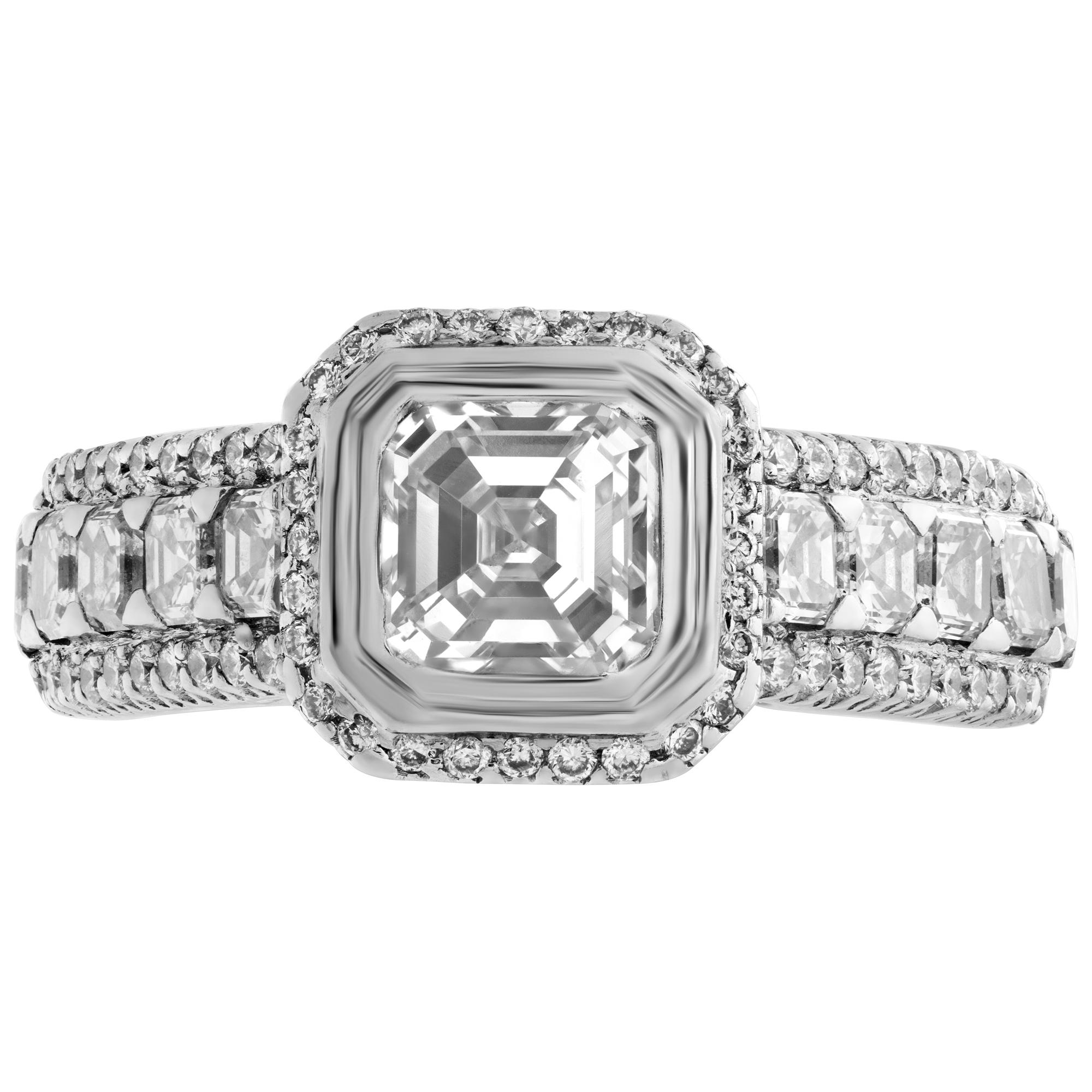 Sparkling and very special diamond ring with approximately 1.05 carat mounted diamond (J-K color, VS1 clarity) set in lovely 18k white gold diamond accents setting. Size 5, width 3mm - 9mm.This Diamond ring is currently size 5 and some items can be