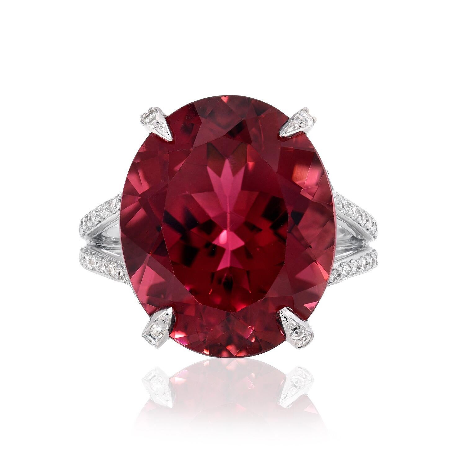 White gold diamond ring showcasing an intense oval Rubellite Tourmaline, weighing a total of 11.90 carats, set in a 0.88 carats total micro pave, 18K white gold diamond ring.
Size 6.5. Resizing is complimentary upon request.
Returns are accepted and
