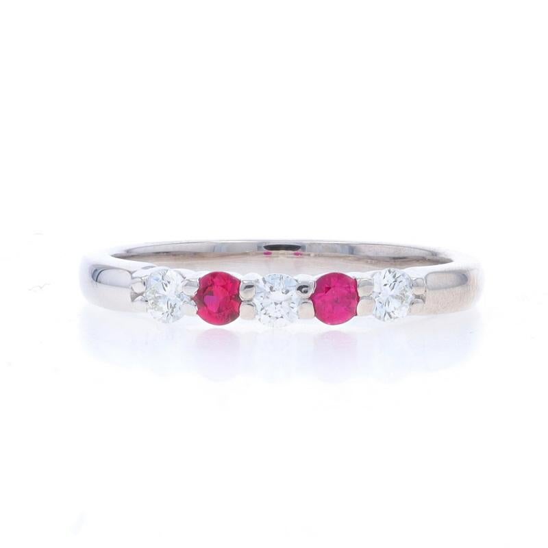 Size: 8 3/4
Sizing Fee: Up 1 size for $50 or Down 1 1/2 sizes for $35

Metal Content: 18k White Gold

Stone Information

Natural Diamonds
Carat(s): .27ctw
Cut: Round Brilliant
Color: I
Clarity: VS1 - VS2

Natural Rubies
Treatment: Heating
Carat(s):
