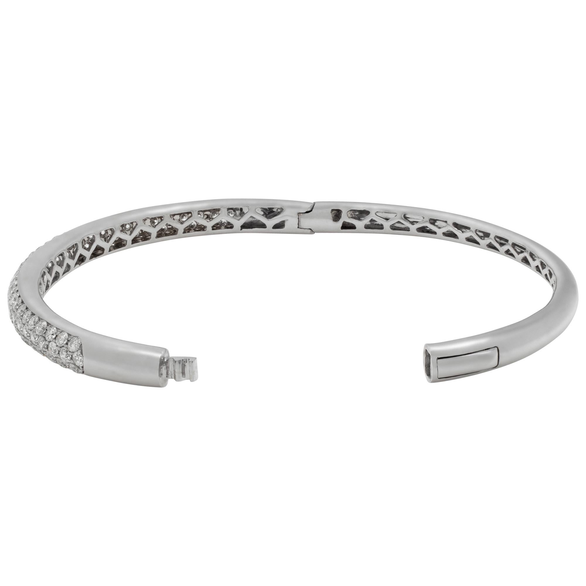 Diamond semi eternity bangle in 18k white gold with 2.80 carats in round cut brilliant diamonds (G-H Color, VS Clarity). Fits wrists up to 7 inches.
