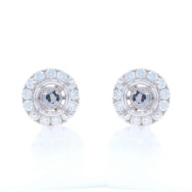Metal Content: 18k White Gold

Stone Information
Natural Diamonds
Carat(s): 2.34ctw
Cut: Round Brilliant
Color: G - H
Clarity: SI1 - SI2

Total Carats: 2.34ctw

Center Fits Stone Size: ~10mm - 12mm

Style: Semi-Mount Studs w/ Halo Jacket