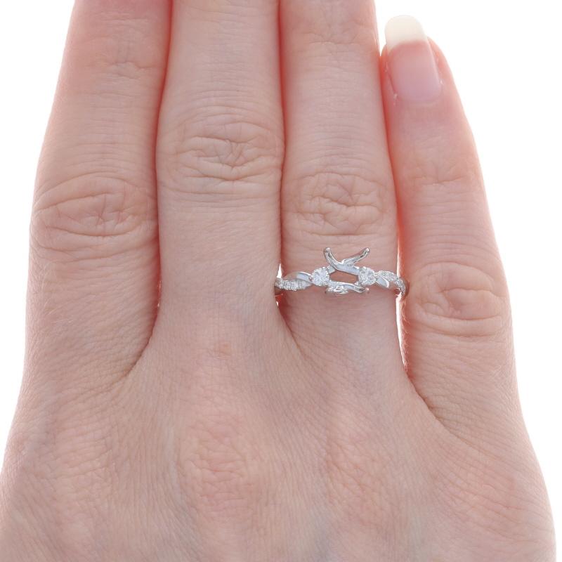 Size: 6 1/2

Note: Please contact us for a resizing quote.

Metal Content: 14k White Gold

Stone Information

Natural Diamonds
Carat(s): .20ctw
Cut: Round Brilliant
Color: F - G
Clarity: VS2 - SI1

Total Carats: .20ctw

Center Fits Stone Size: 8mm x