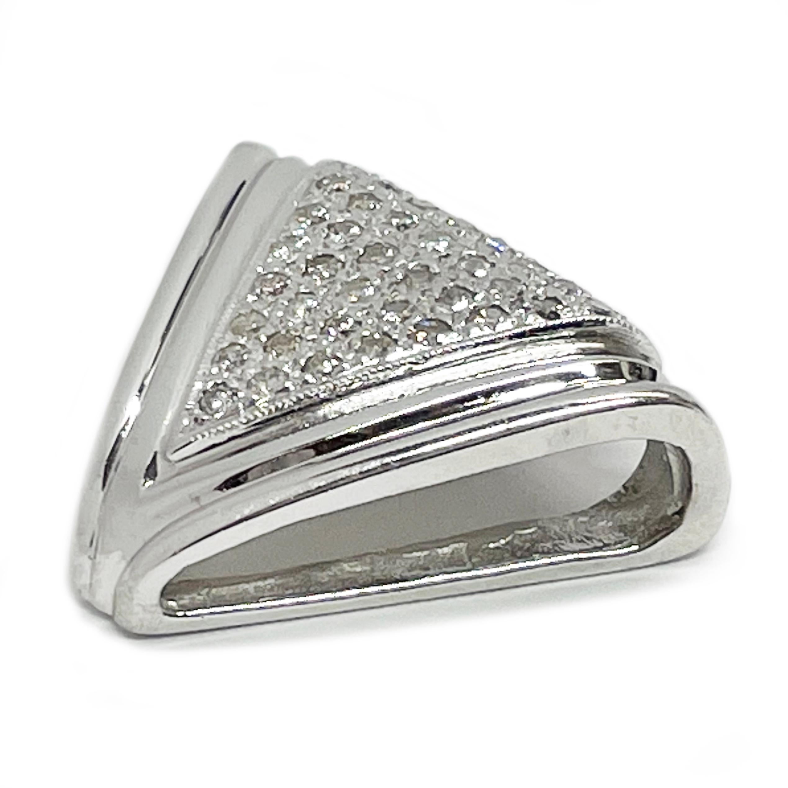 Indulge in the mesmerizing allure of our 14 karat white gold diamond slide pendant, an exquisite testament to sophistication and refinement. The triangular shaped pendant features thirty-six round diamonds pavel-set in white gold with milgrain