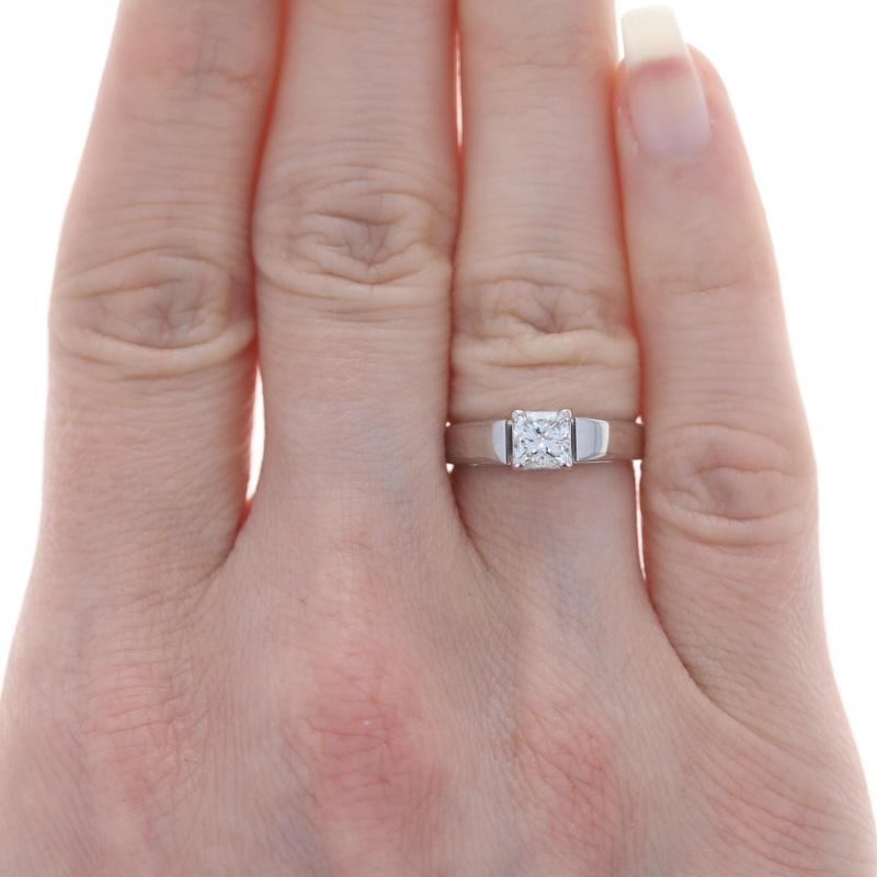 Size: 5
Sizing Fee: Up 2 sizes for $35 or Down 1 size for $30

Metal Content: 14k White Gold

Stone Information

Natural Diamond
Carat(s): .70ct
Cut: Princess
Color: K
Clarity: I1

Total Carats: .70ct

Style: Solitaire
Features: Cathedral