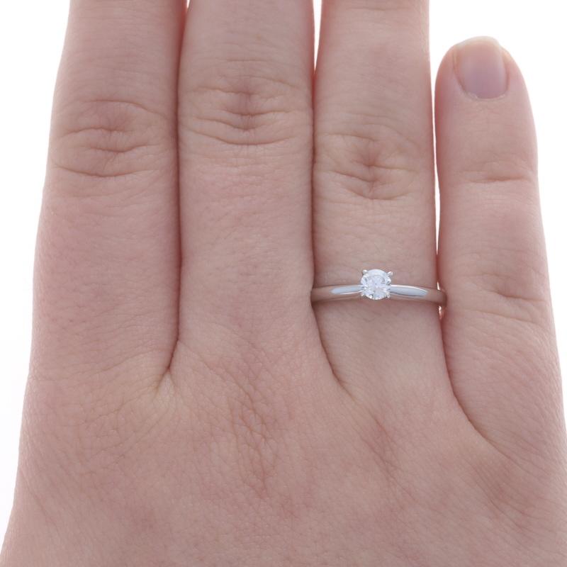 Size: 8
Sizing Fee: Up 5 sizes for $40 or Down 5 sizes for $30

Metal Content: 14k White Gold

Stone Information

Natural Diamond
Carat(s): .26ct (carat stamp)
Cut: Round Brilliant
Color: F
Clarity: I1

Total Carats: .26ct

Style: