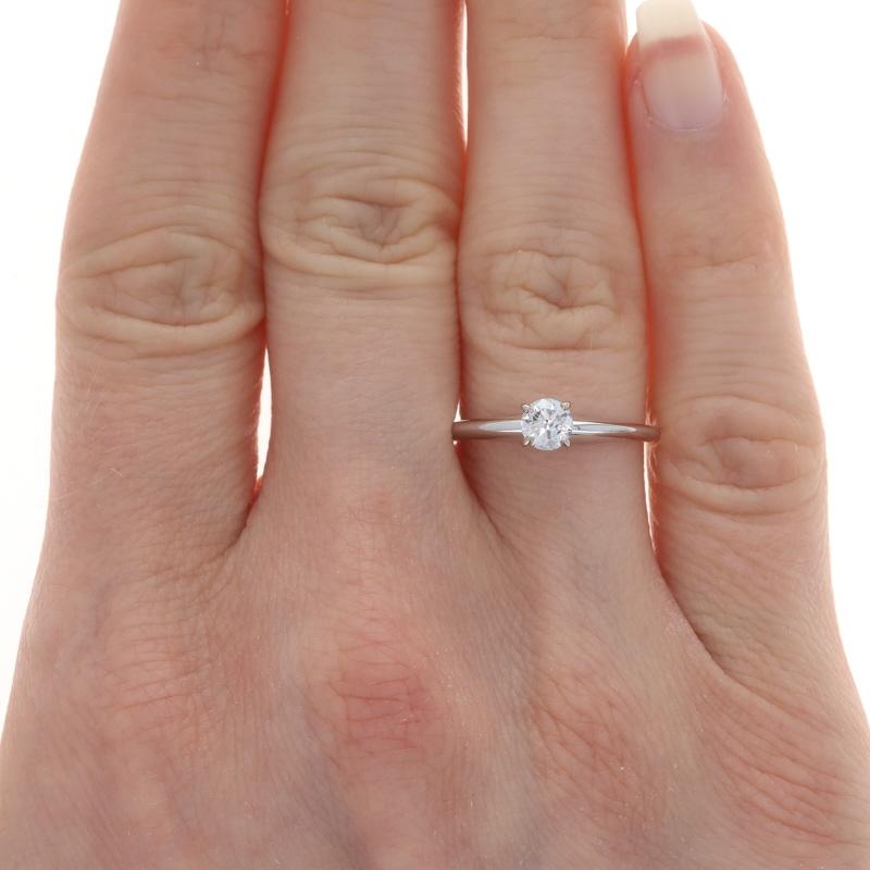 Size: 6 3/4
Sizing Fee: Up 2 sizes for $35 or Down 3 sizes for $30

Metal Content: 14k White Gold

Stone Information

Natural Diamond
Carat(s): .35ct
Cut: Round Brilliant
Color: F
Clarity: I1

Total Carats: .35ct

Style: