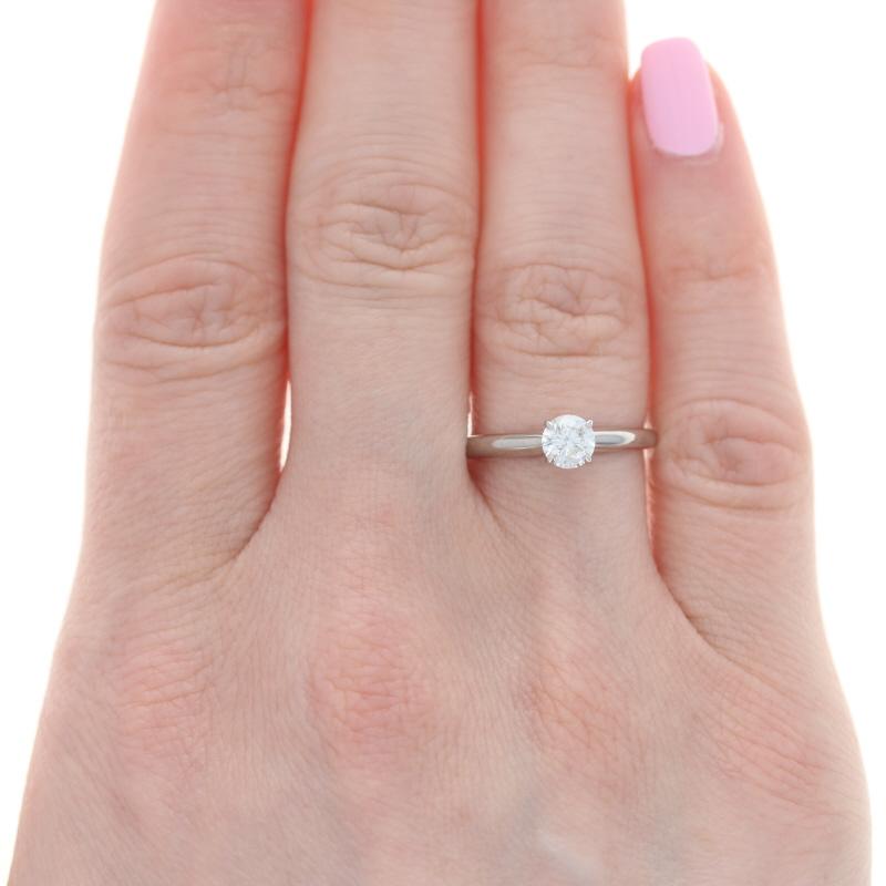 Size: 6 3/4
Sizing Fee: Down 3 for $30 or up 2 for $35

Metal Content: 14k White Gold

Stone Information
Natural Diamond
Carat(s): .47ct
Cut: Round Brilliant
Color: H
Clarity: I2

Style: Solitaire

Measurements
Face Height (north to south): 7/32