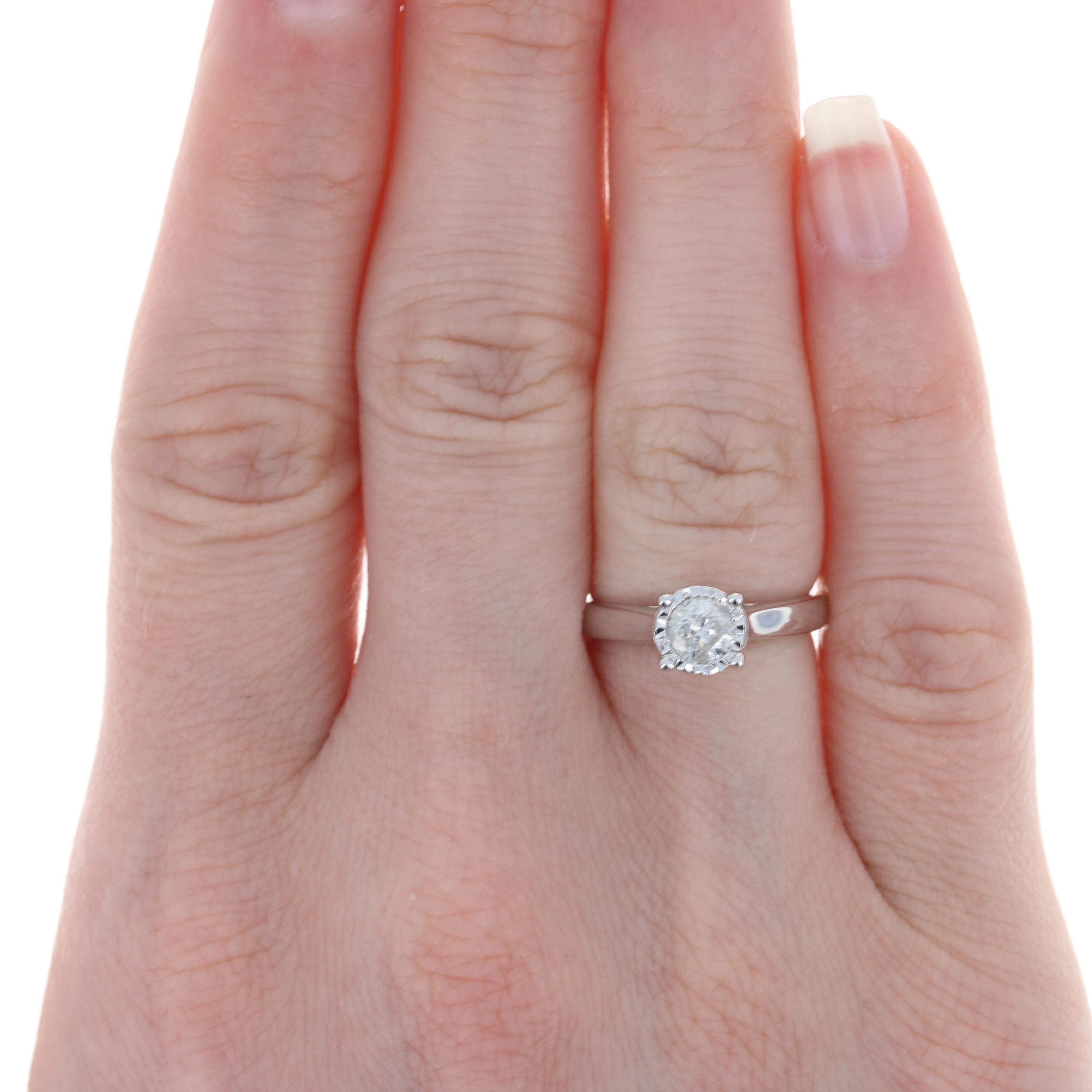 Size: 4 3/4
 Sizing Fee: Up 2 sizes for $25 or down 1 size for $20
 
 Metal Content: 14k White Gold 
 
 Stone Information: 
 Natural Diamond
 Carat: .50ct
 Cut: Round Brilliant 
 Color: I 
 Clarity: I2
 
 Style: Solitaire
 Features: Cathedral Mount