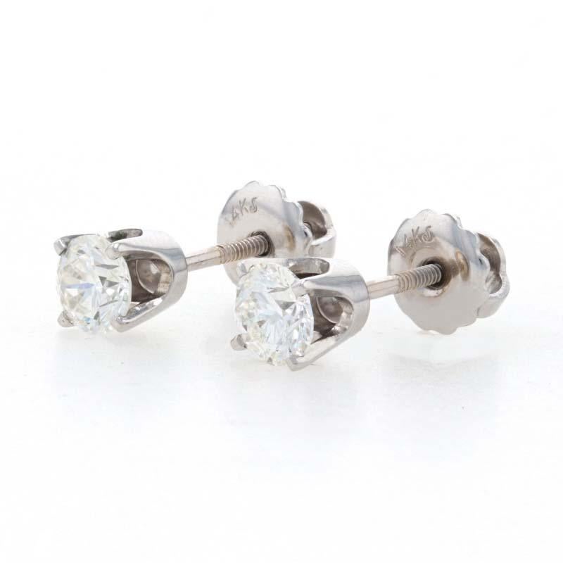 Metal Content: 14k White Gold

Stone Information
Natural Diamonds
Total Carats: .73ctw
Cut: Round Brilliant 
Color: H - I
Clarity: VS1 - VS2

Style: Stud 
Fastening Type: Pierced Screw-On Closures

Measurements
Diameters: 
3/16