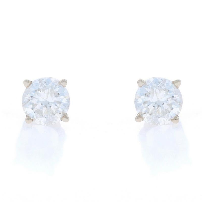 Metal Content: 14k White Gold

Stone Information

Natural Diamonds
Carat(s): 1.04ctw
Cut: Round Brilliant
Color: H - I
Clarity: I2

Total Carats: 1.04ctw

Style: Stud
Fastening Type: Butterfly Closures

Measurements

Item 1: Earring 1
Diameter: