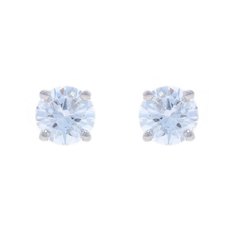 Metal Content: 14k White Gold

Stone Information
Natural Diamonds
Carat(s): 1.04ctw
Cut: Round Brilliant
Color: E - F
Clarity: SI2 - I1

Total Carats: 1.04ctw

Style: Stud
Fastening Type: Butterfly Closures

Measurements
Tall: 7/32