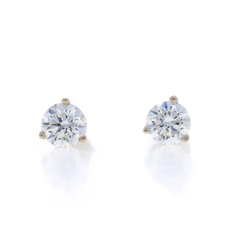 Metal Content: 14k White Gold

Stone Information

Natural Diamonds
Carat(s): 1.42ctw
Cut: Round Brilliant
Color: E - F
Clarity: SI2 - I1

Total Carats: 1.42ctw

Style: Stud
Fastening Type: Butterfly Closures

Measurements

Tall: 1/4