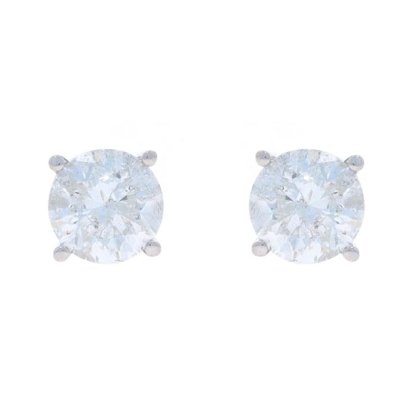 Metal Content: 14k White Gold

Stone Information

Natural Diamonds
Carat(s): 2.00ctw
Cut: Round Brilliant
Color: G - H
Clarity: I2

Total Carats: 2ctw

Style: Stud
Fastening Type: Pierced Screw-On Closures

Measurements

Tall: 9/32