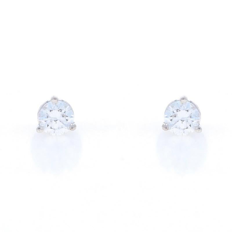 Metal Content: 14k White Gold

Stone Information

Natural Diamonds
Carat(s): .60ctw
Cut: Round Brilliant
Color: F - G
Clarity: VS2

Total Carats: .60ctw

Style: Stud
Fastening Type: Pierced Screw-On Closures

Measurements

Tall: 7/32