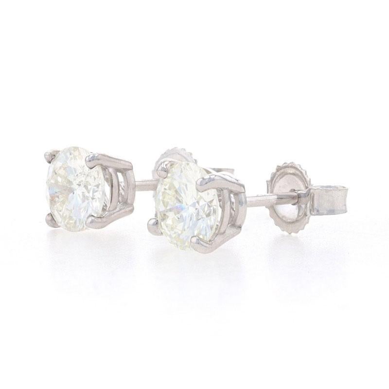 Metal Content: 14k White Gold 

Stone Information: 
Natural Diamonds
Total Carats: 1.08ctw 
Cut: Round Brilliant 
Color: J
Clarity: SI2 

Style: Stud   
Fastening Type: Butterfly Closures

Measurements
Diameter: 7/32