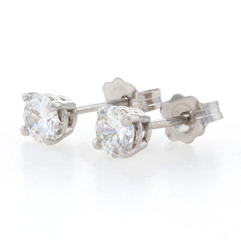 Metal Content: 14k White Gold

Stone Information
Natural Diamonds
Total Carats: .53ctw
Cut: Round Brilliant
Color: G - H
Clarity: SI2 - I1

Style: Stud 
Fastening Type: Butterfly Closures

Measurements
Diameter: 3/16