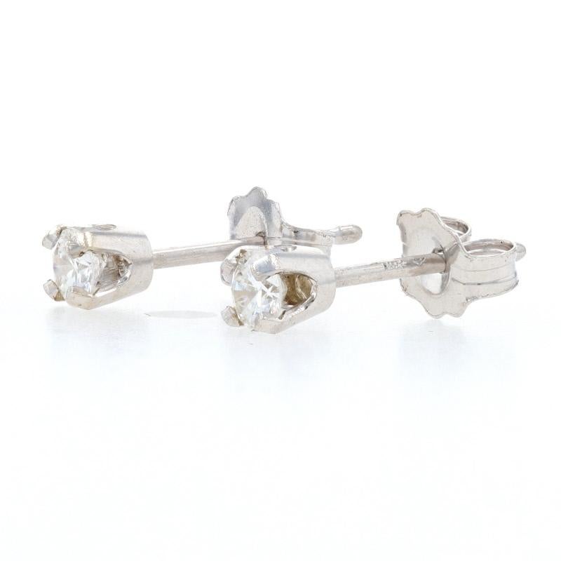Round Cut White Gold Diamond Stud Earrings, 14 Karat Round Brilliant Cut .60 Carat Pierced