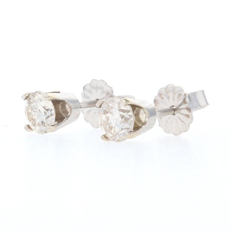 Round Cut White Gold Diamond Stud Earrings, 14 Karat Round Brilliant Cut .81 Carat Pierced For Sale