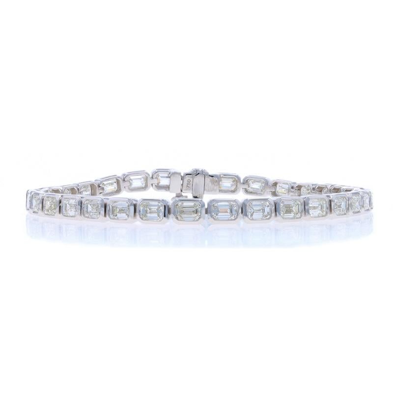 Metal Content: 18k White Gold

Stone Information

Natural Diamonds
Carat(s): 8.05ctw
Cut: Emerald
Color: F - G
Clarity: VS1 - VS2

Total Carats: 8.05ctw

Style: Tennis
Fastening Type: Tongue Box Clasp with Fold-Under Safety