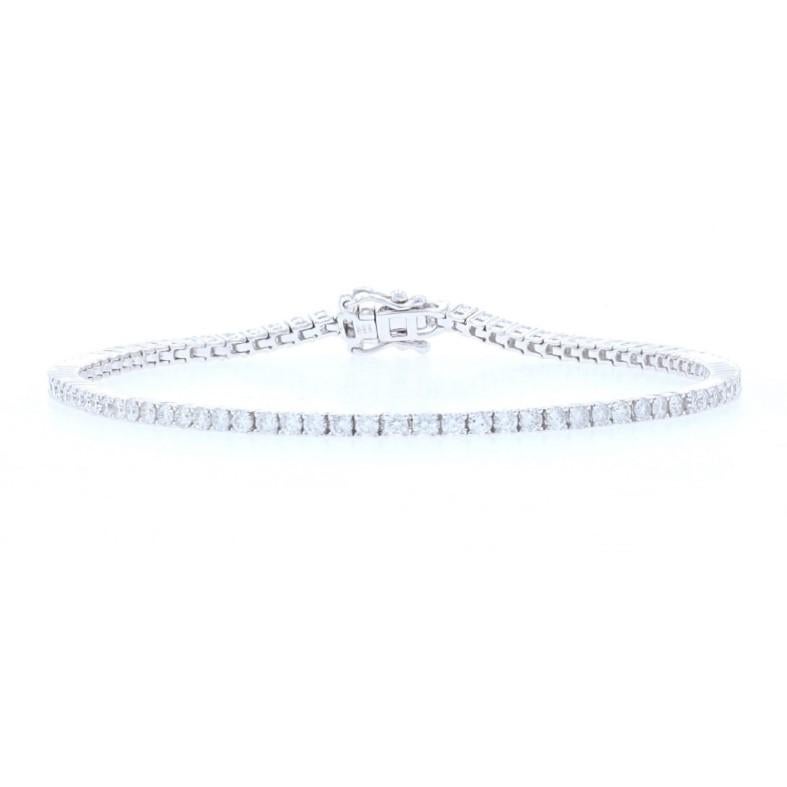 Metal Content: 14k White Gold 

Stone Information: 
Natural Diamonds
Total Carats: 2.37ctw
Cut: Round Brilliant 
Color: G - H
Clarity: SI1 - SI2

Bracelet Style: Tennis
Closure Type: Tab Box Clasp with Two Side Safety Clasps

Measurements: 
Length: