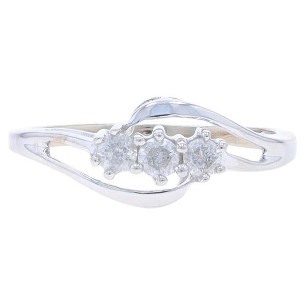 White Gold Diamond Three-Stone Bypass Ring - 10k Round Brilliant .25ctw For Sale