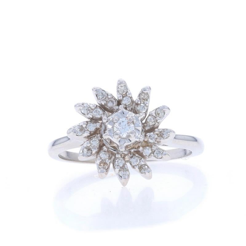 Size: 6 1/4
Sizing Fee: Up 3 sizes for $35 or Down 2 sizes for $35

Era: Vintage

Metal Content: 14k White Gold

Stone Information

Natural Diamonds
Carat(s): .17ctw
Cut: Round Brilliant
Color: G - H
Clarity: SI1 - SI2

Total Carats: .17ctw

Style: